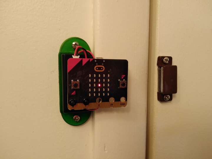 A circuit board displaying a light when the adjacent door is closed